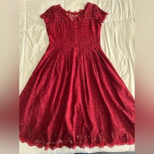 Pinup style lace fit and flare party dress. Fits size 12